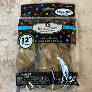 Unopened pack of gold balloons